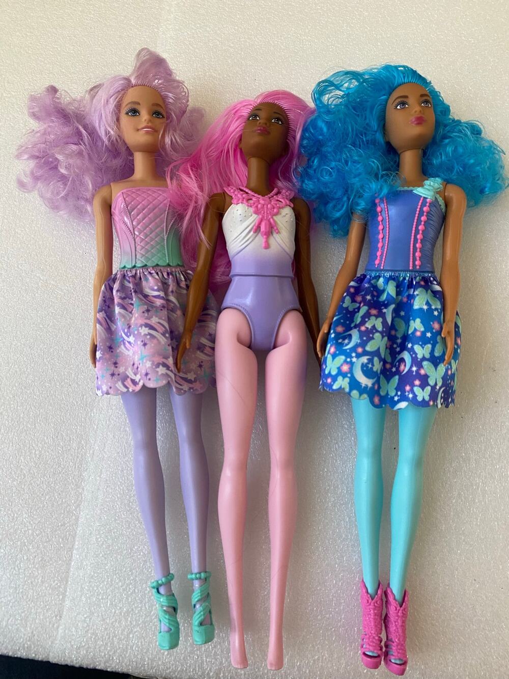 three fashion dolls the 2023 Dreamtopia Barbie Fairy Unicorn 4-Pack by Mattel